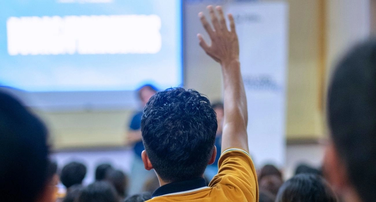 Engaging with an audience at a seminar.